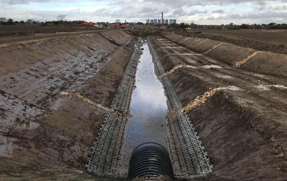 Pumped approach drain construction