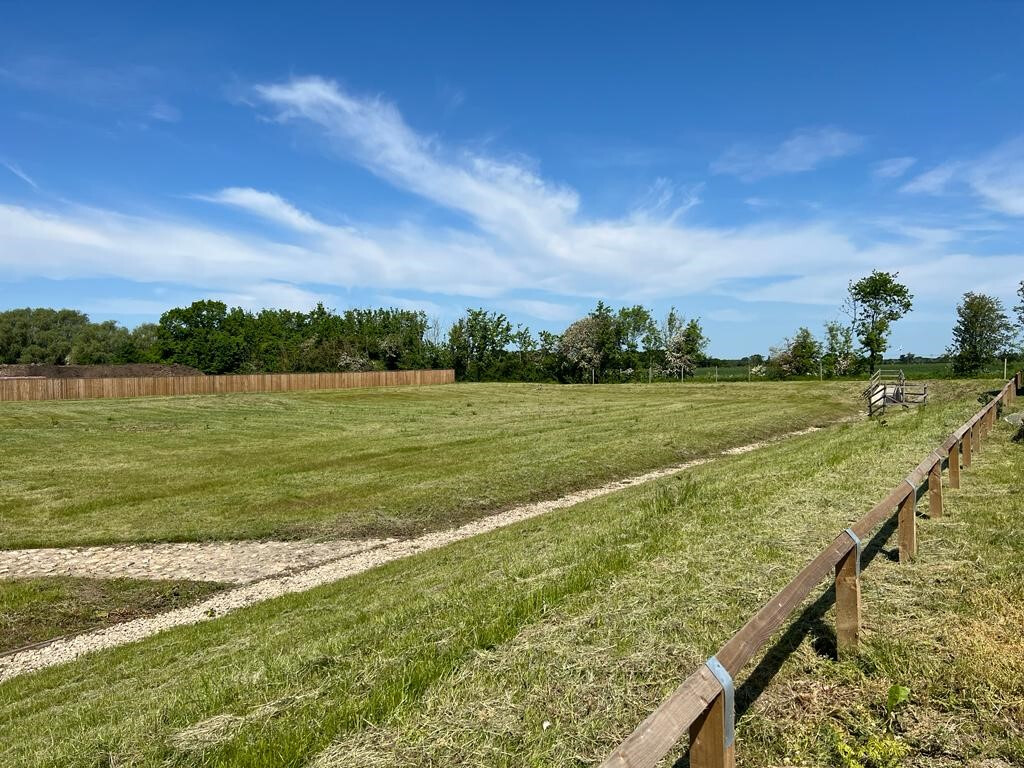 Completed attenuation basin earthworks beside Paternoster Drain