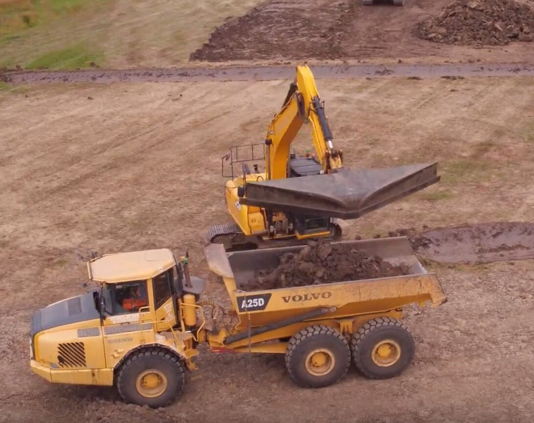 Bespoke angled bucket to increase efficiency and programme