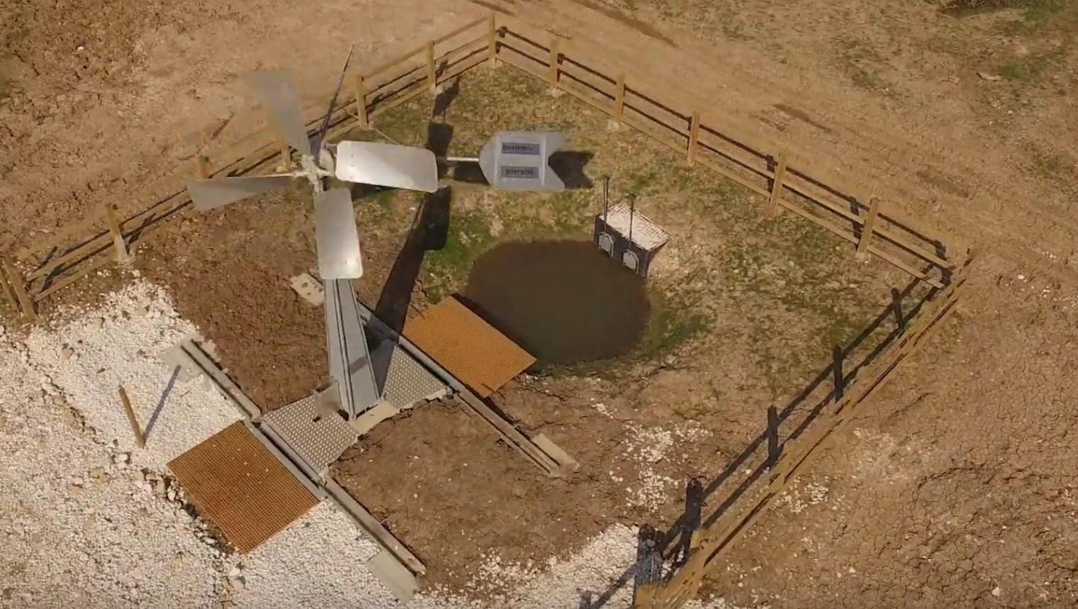 Wind turbine pump installation