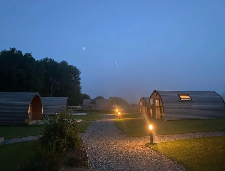Flamborough glamping site at dusk