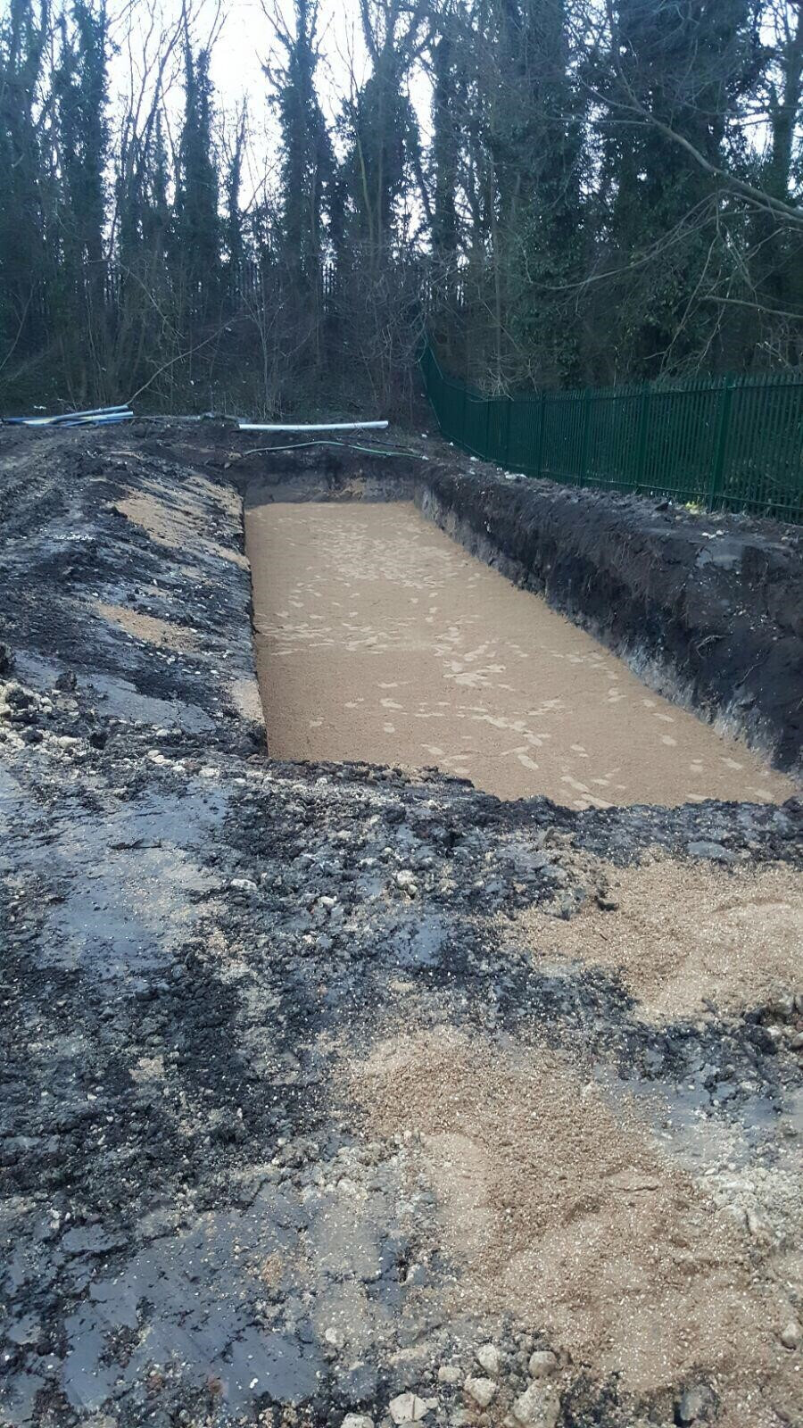 Excavated SuDS storage area before liner installation