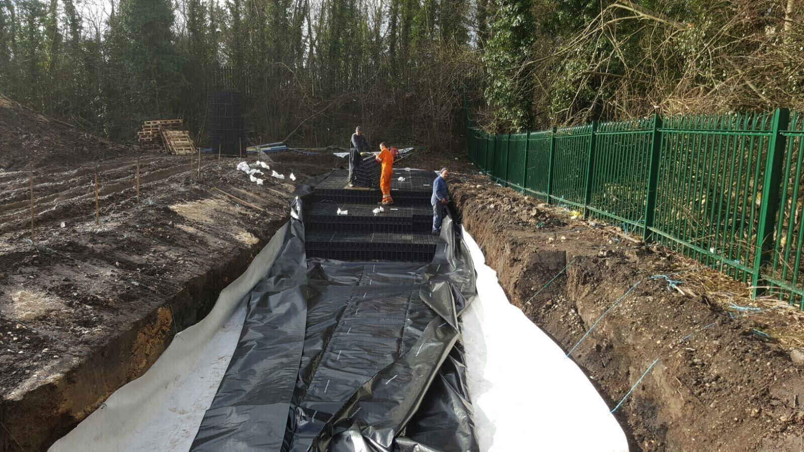Encapsulating liner installed before crate construction