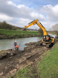 Excavator undertaking River Rother restoration works